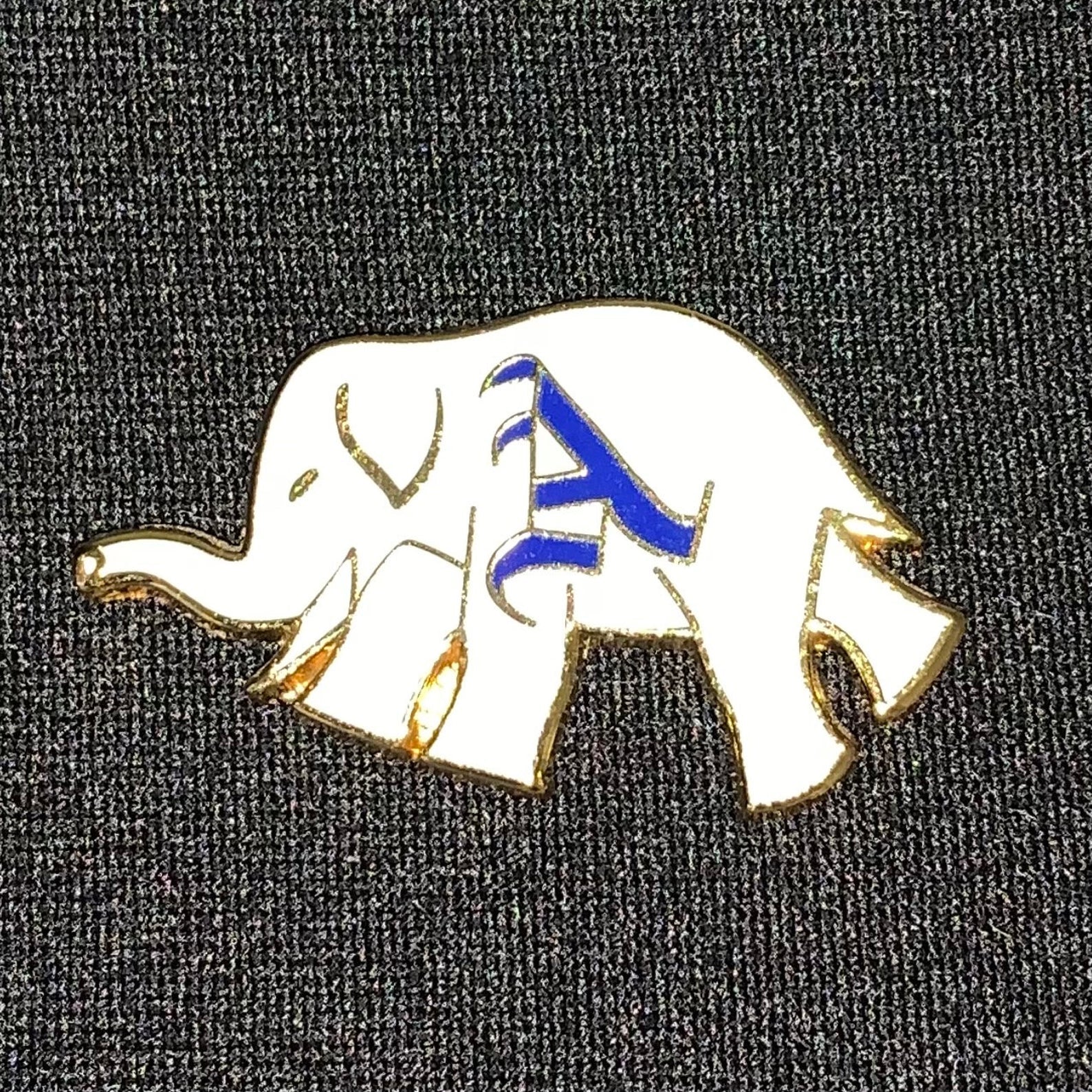 Athletics White Elephant pin